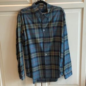 New without tags Men’s custom fit XL Polo button down shirt.